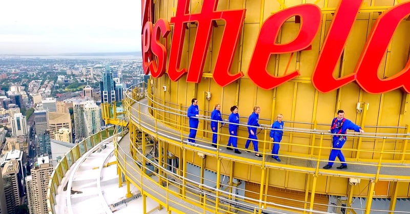 Group of toursits having a skywalk tour in the Sydney Tower Eye.